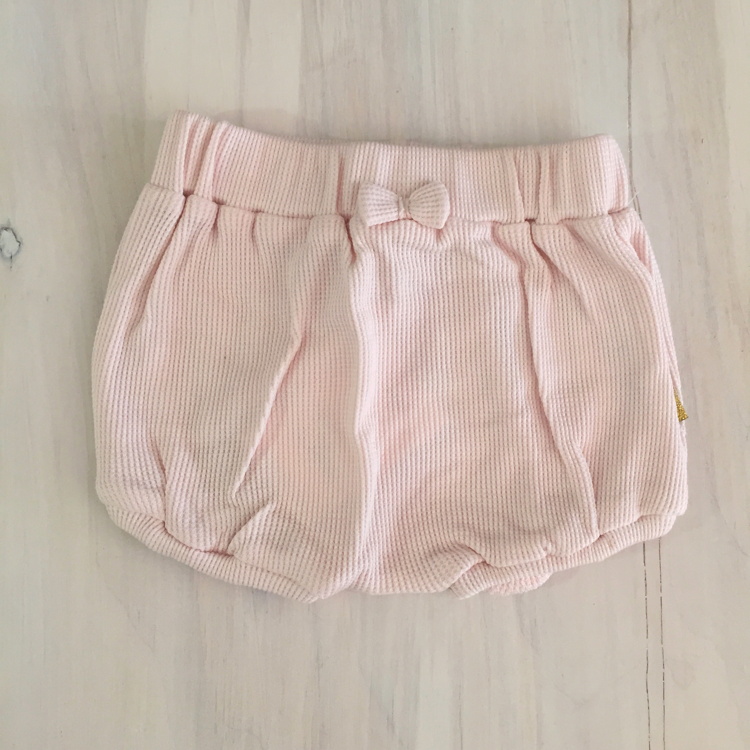 pantaloncini-corti-rosa-chiaro