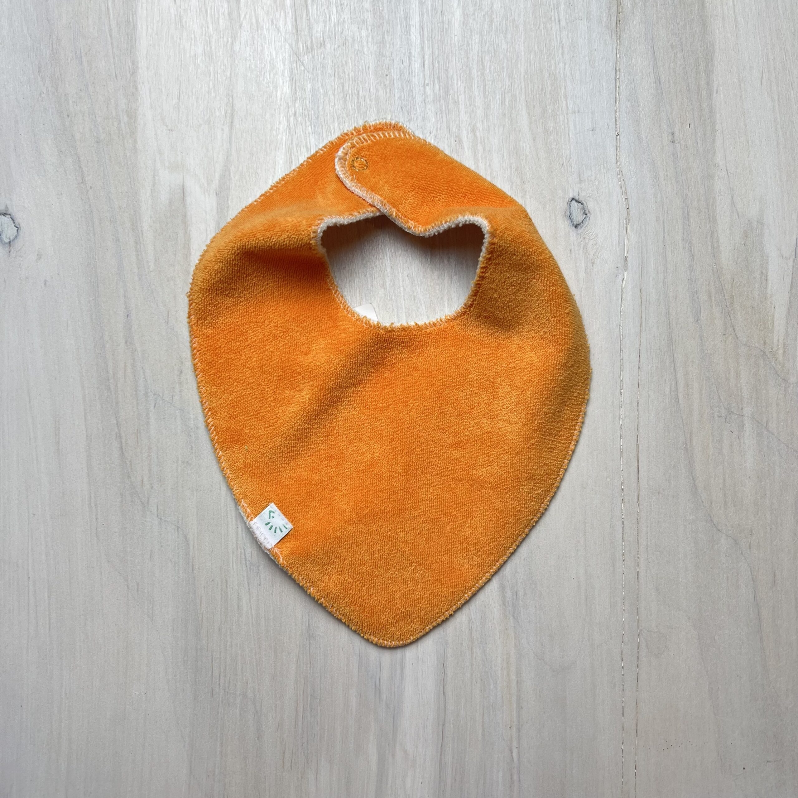 bavetta-triangolo-cotone-bio-arancione-popolini-bandana